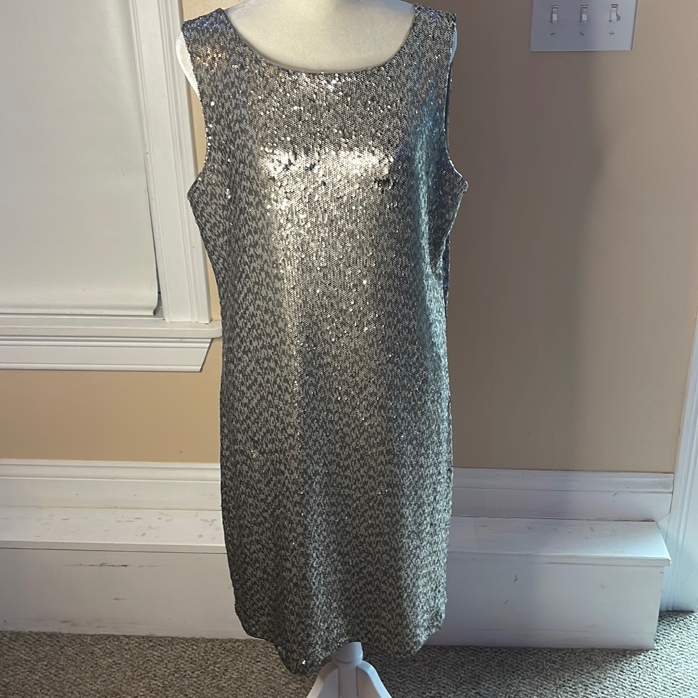 Gorgeous taupe sequin sheath dress with mesh trim detail. Fully lined. EUC